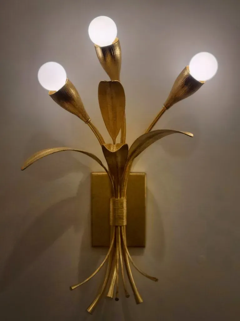 Gold, botanical inspired light fixture